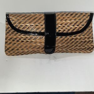 Straw bag, patent leather strap over